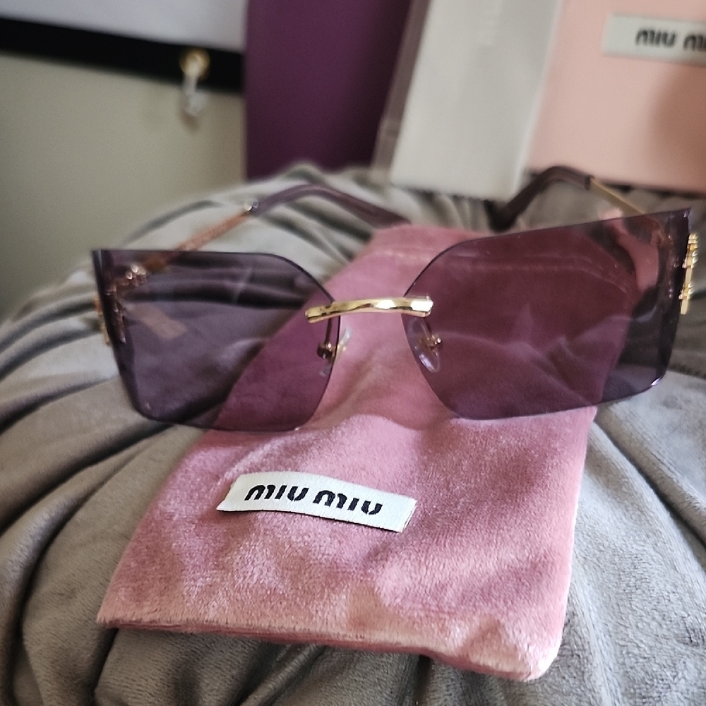 Miu Miu Violet Sunglasses with Gold Accents. FULL INCLUSION. NO CALLOUTS.